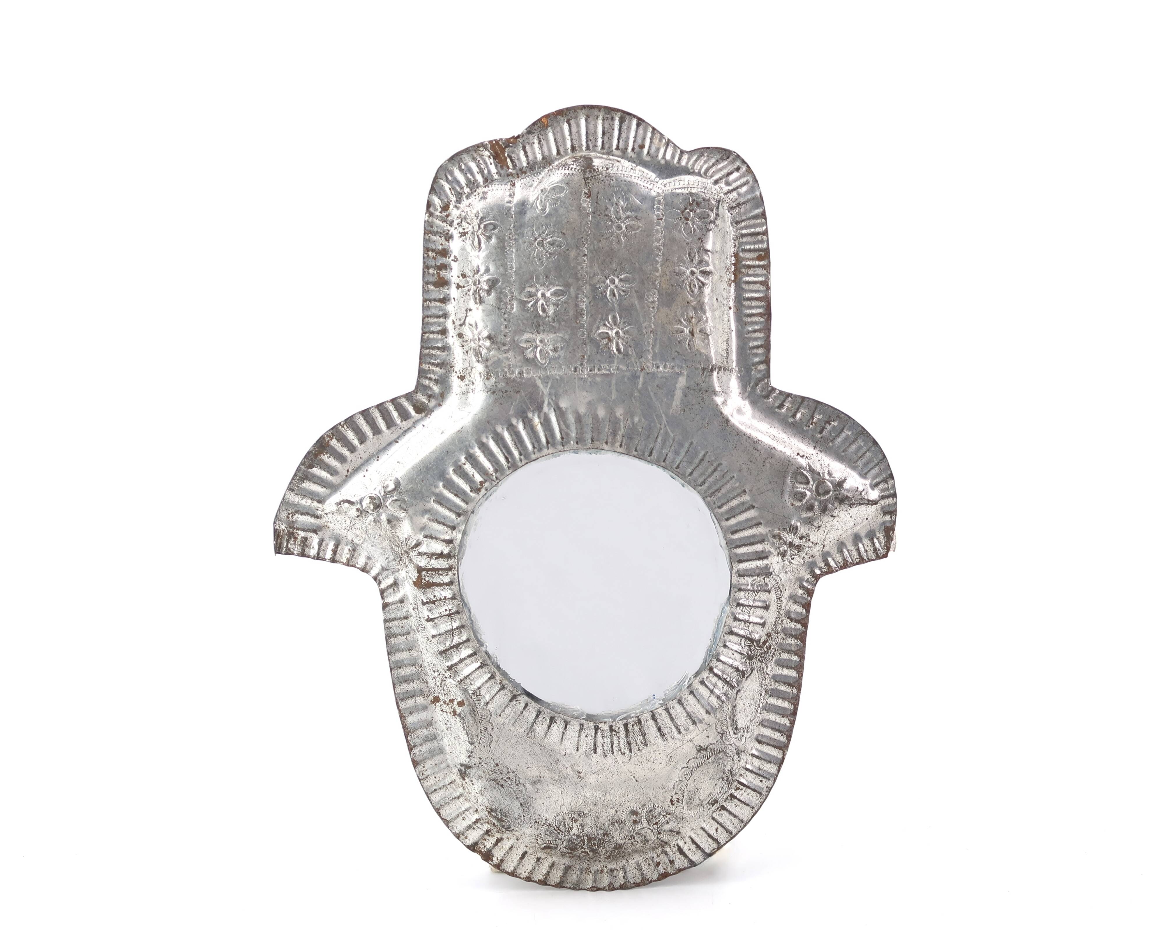 Moroccan metal mirror in the shape of a hand, 1970s
