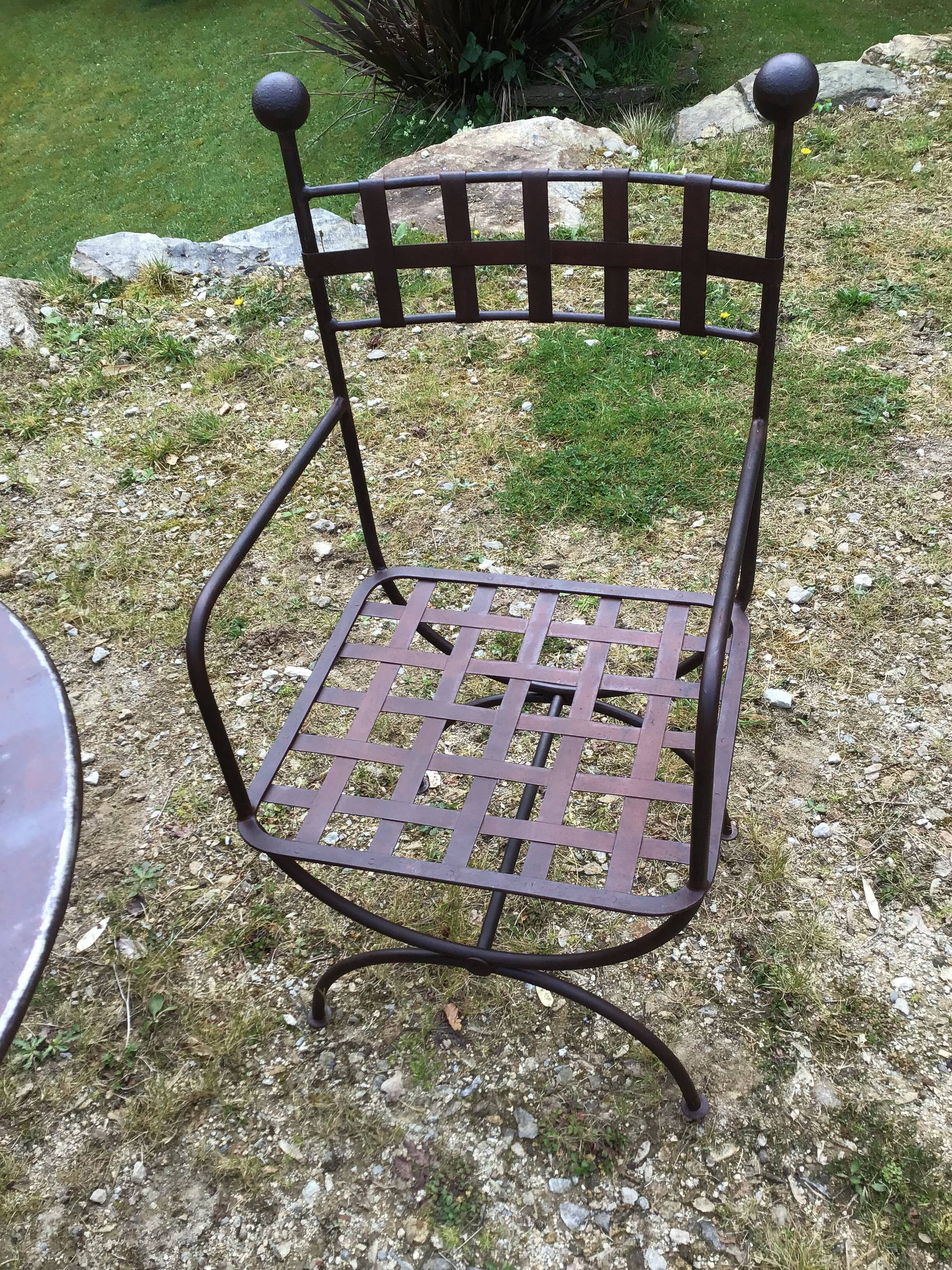 Table & 6 wrought iron chairs, 6 cushions