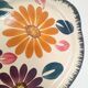 Floral cake dish in Boch brothers earthenware