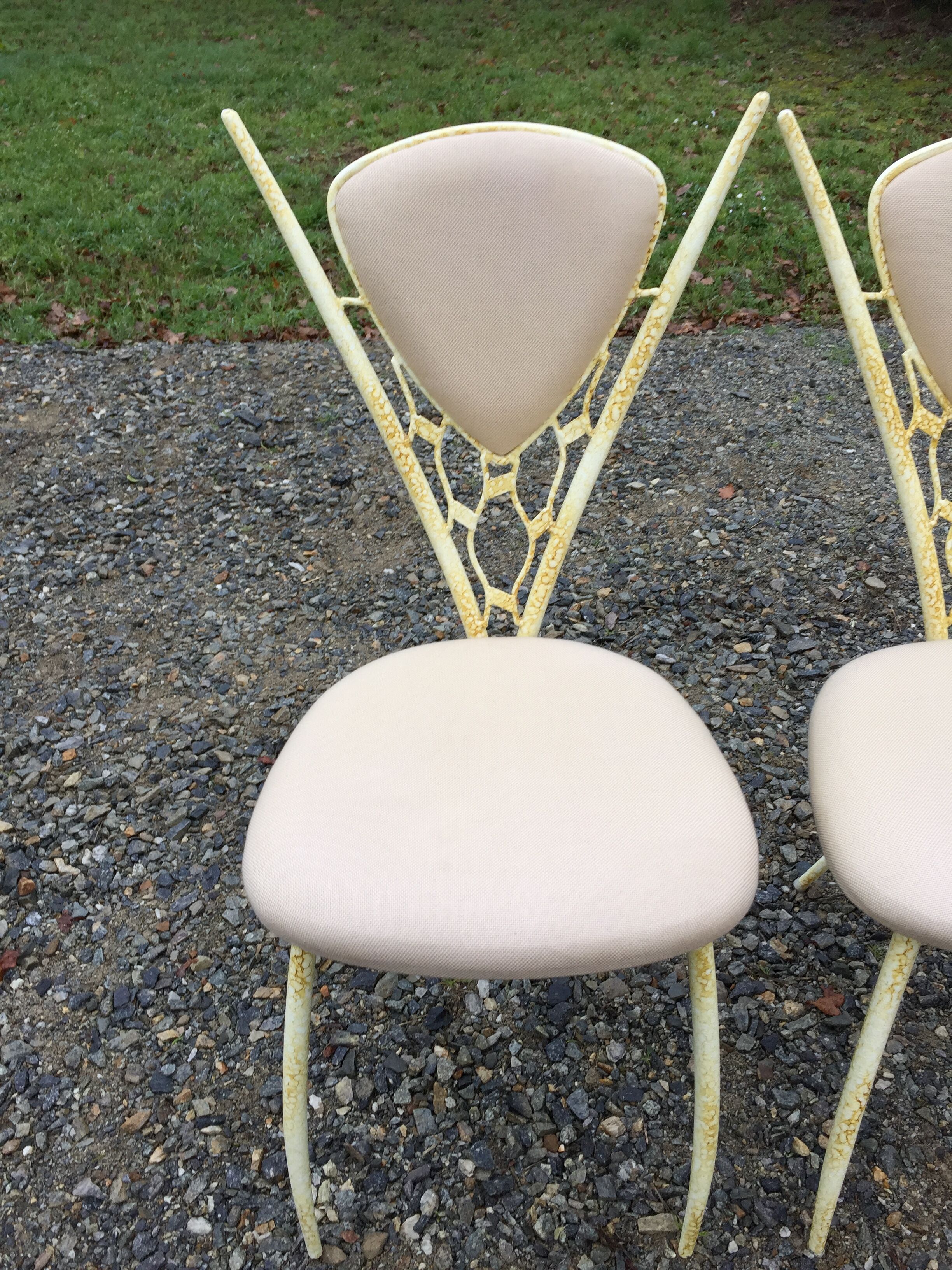 4 vintage chairs in tubular metal lacquered white yellow.
