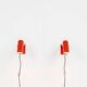 Pair of red metal wall lights