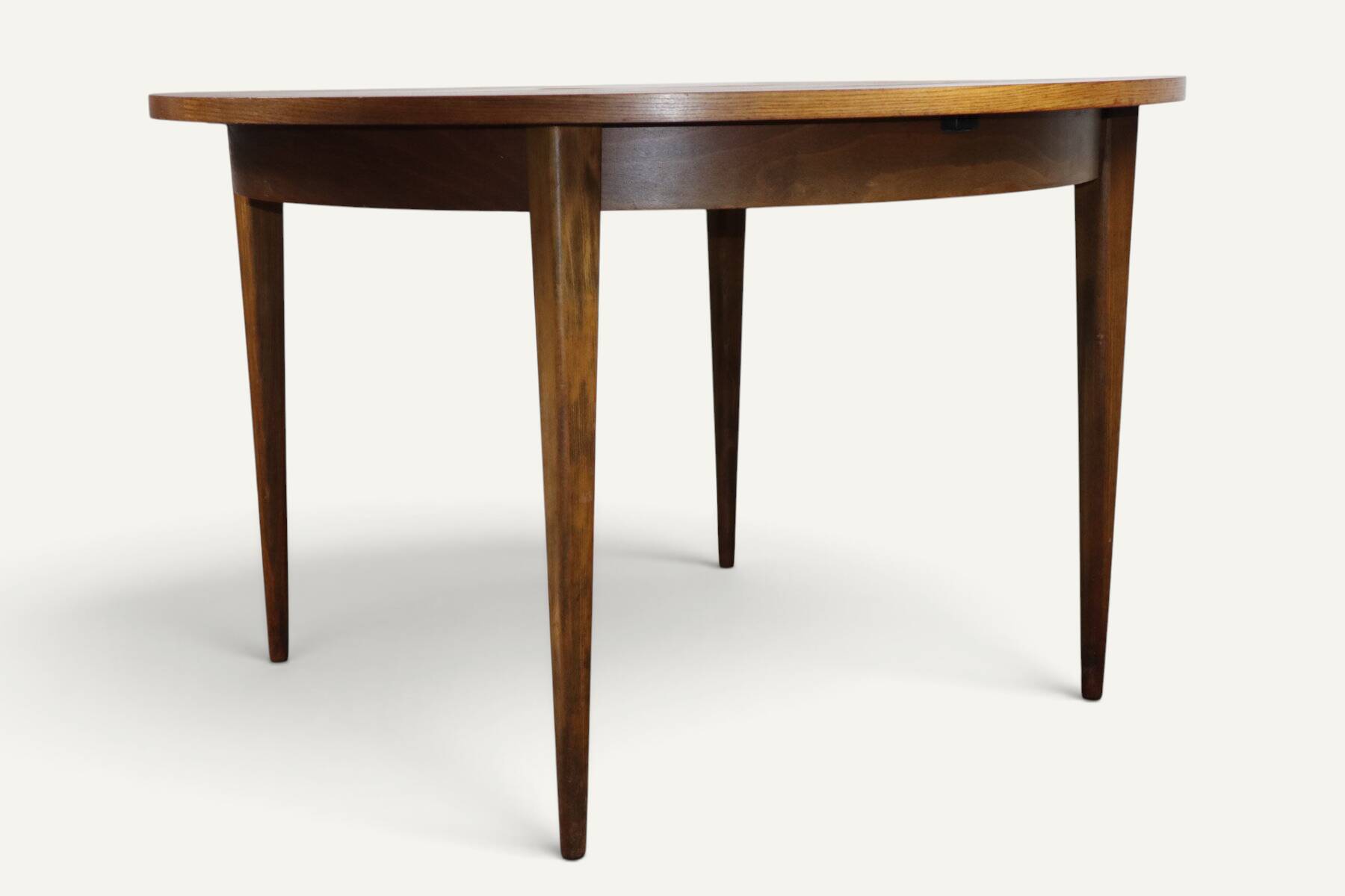 Round extendable dining table in teak – 1960s