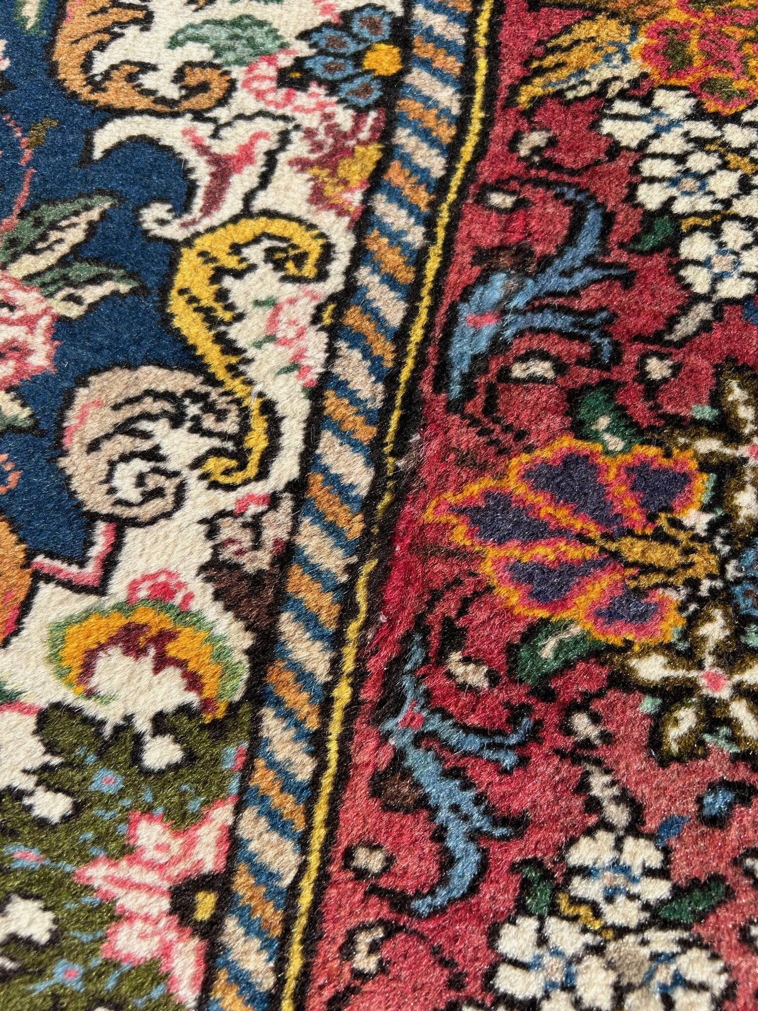 tapis d'orient à décor d'oiseaux 150/205cm