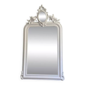 Mirror from the late 19th century with a decorated pediment. 112x66.