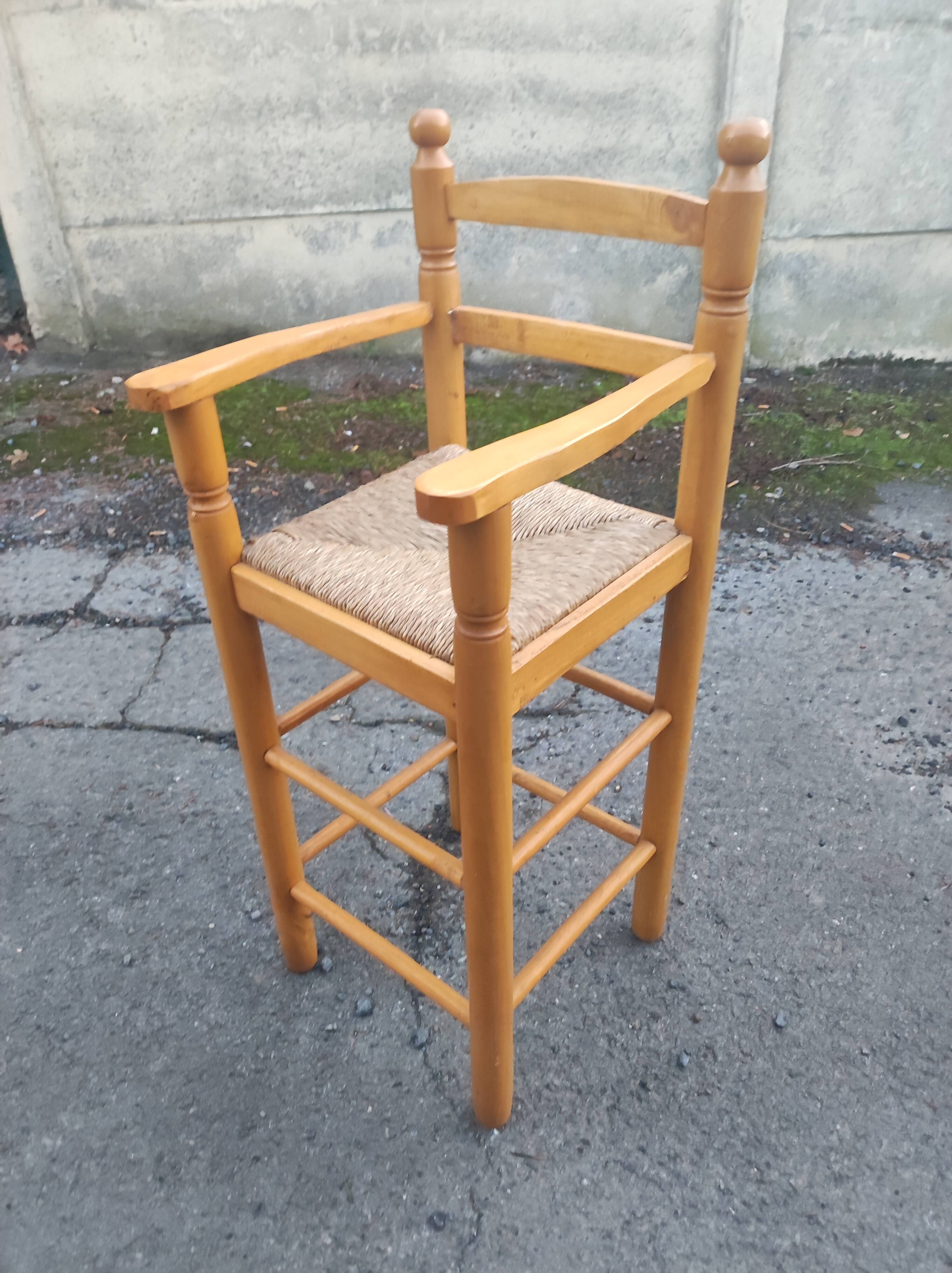 Chaise haute enfant paillée et bois vintage