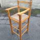 Chaise haute enfant paillée et bois vintage