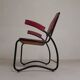 Set of 4 armchairs and a coffee table with tubular structure in Bauhaus style, 1950s.