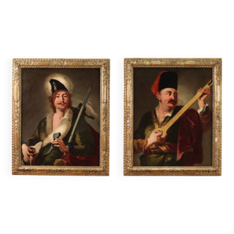 Pair of 18th century antique paintings, portraits in traditional costume