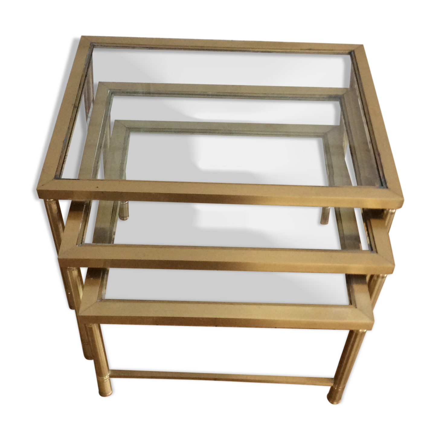 Nesting tables in glass and brass