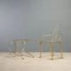 Louis Ghost chairs by Kartell designed by Philippe Starck from the 2000s.