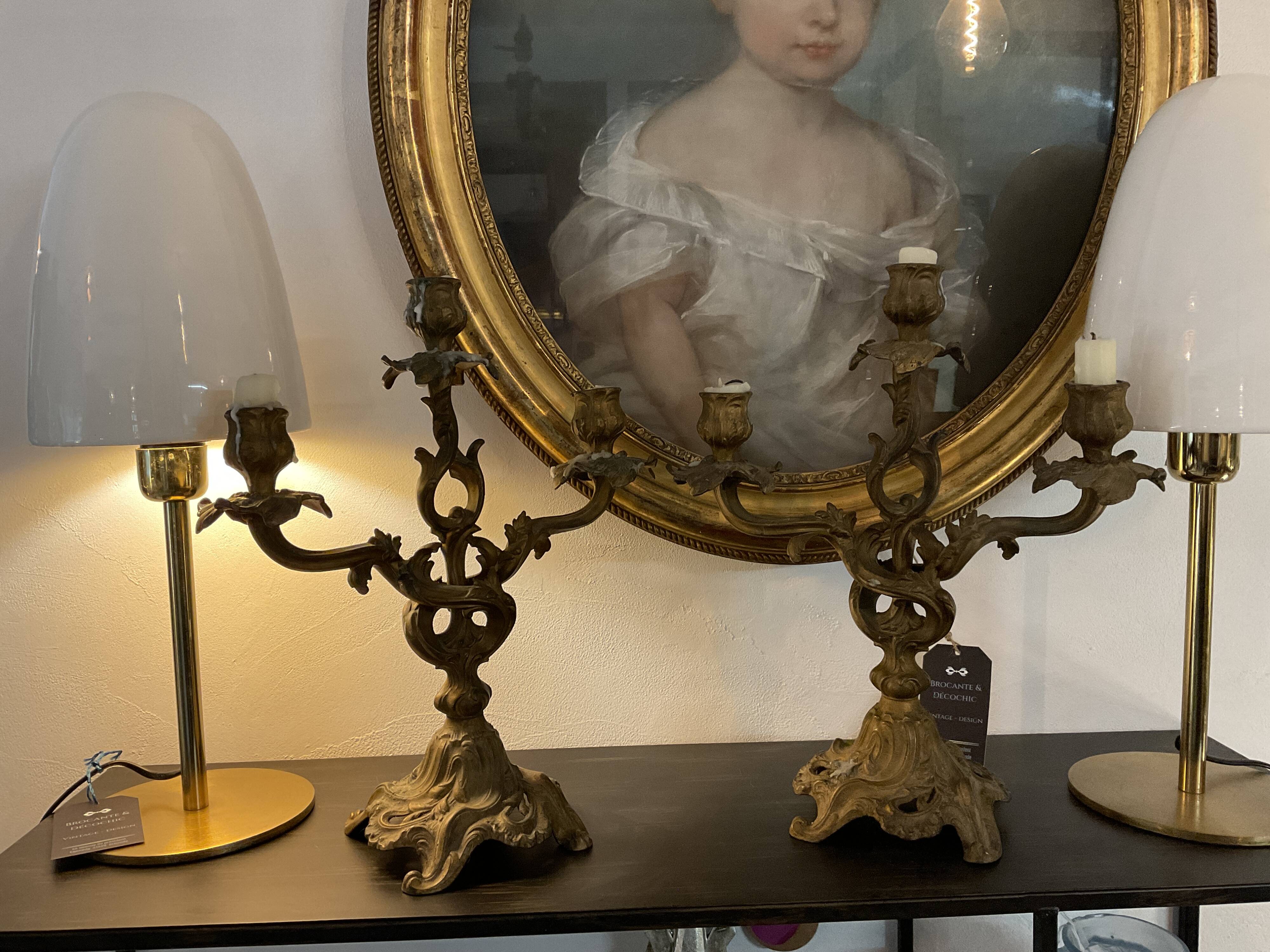 Pair of 3-branch candlesticks. Bronze