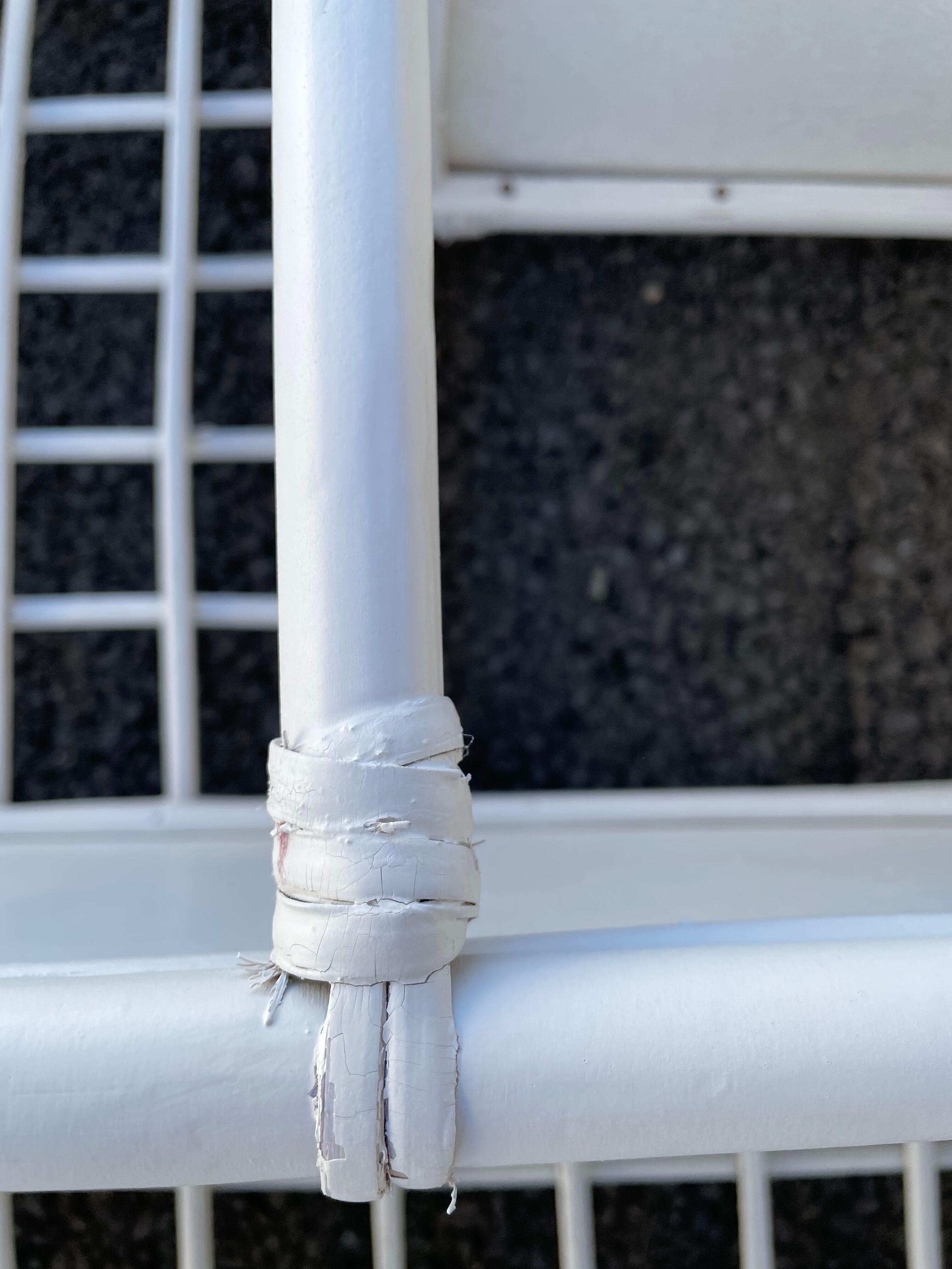 White rattan shelf with braces