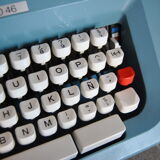 Blue typewriter Ollivetti Studiu 46 years 70