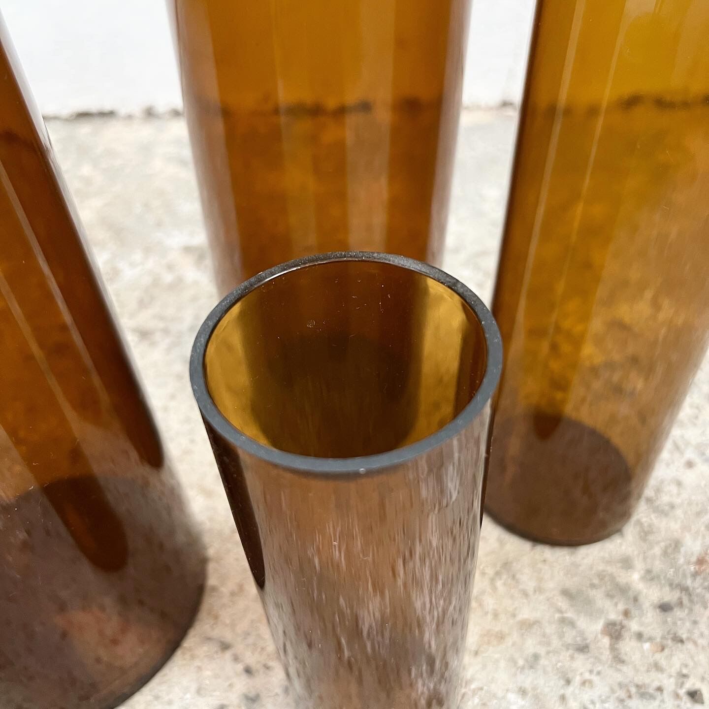 4 Jacques Bédat trundle vases in smoked plexiglass