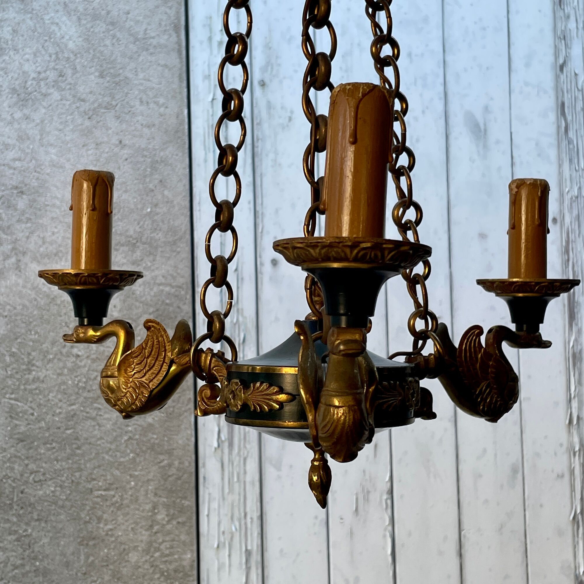 Lucien gau chandelier pendant lamp in bronze with swan decoration.