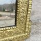19th-century antique mirror in carved gilded wood, Napoleon style.