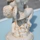 Pair of "cherub" candle holders in plaster