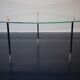 Vintage glass and black-painted brass side table