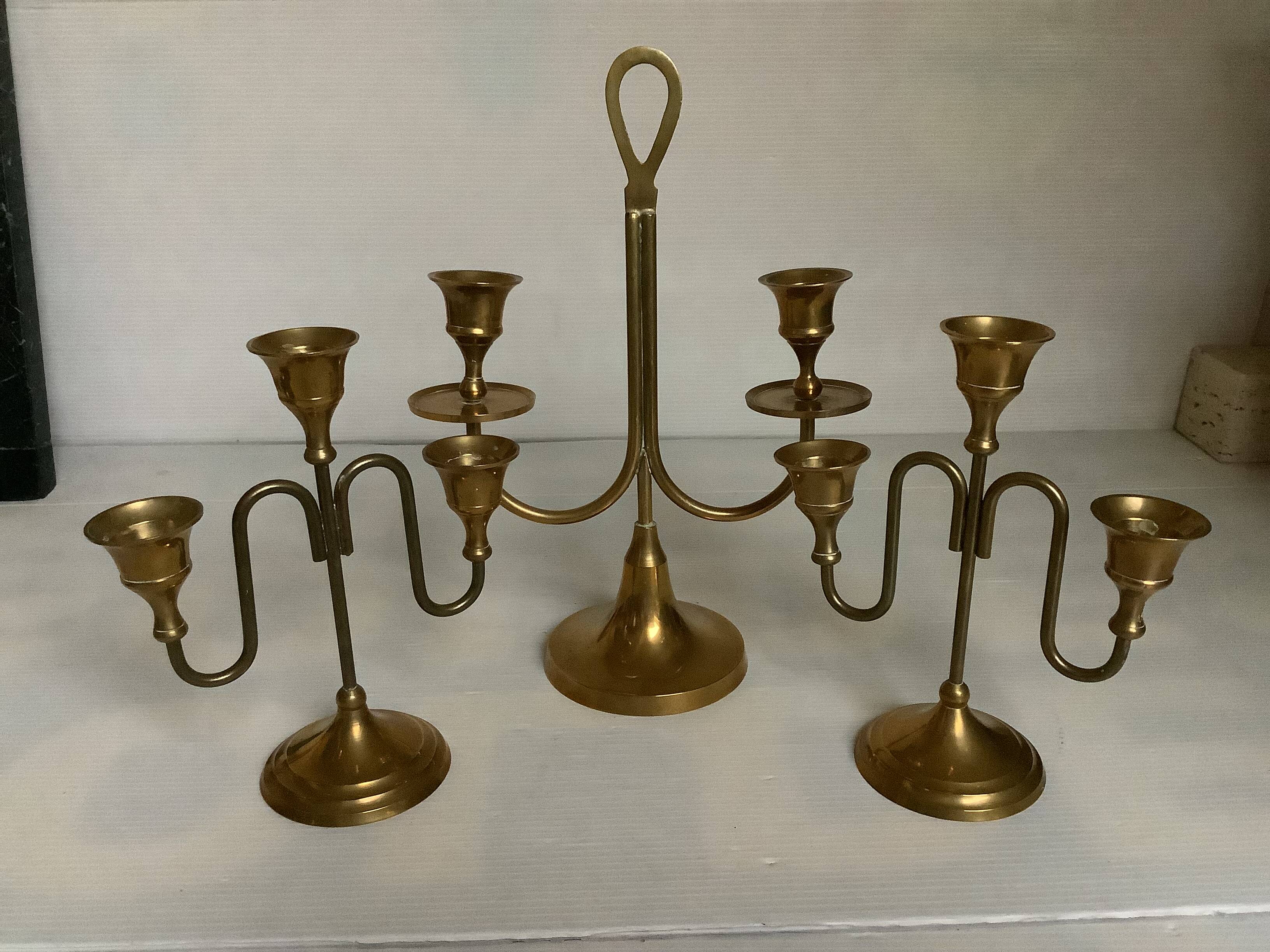 Trio of brass candlesticks with tulip bases