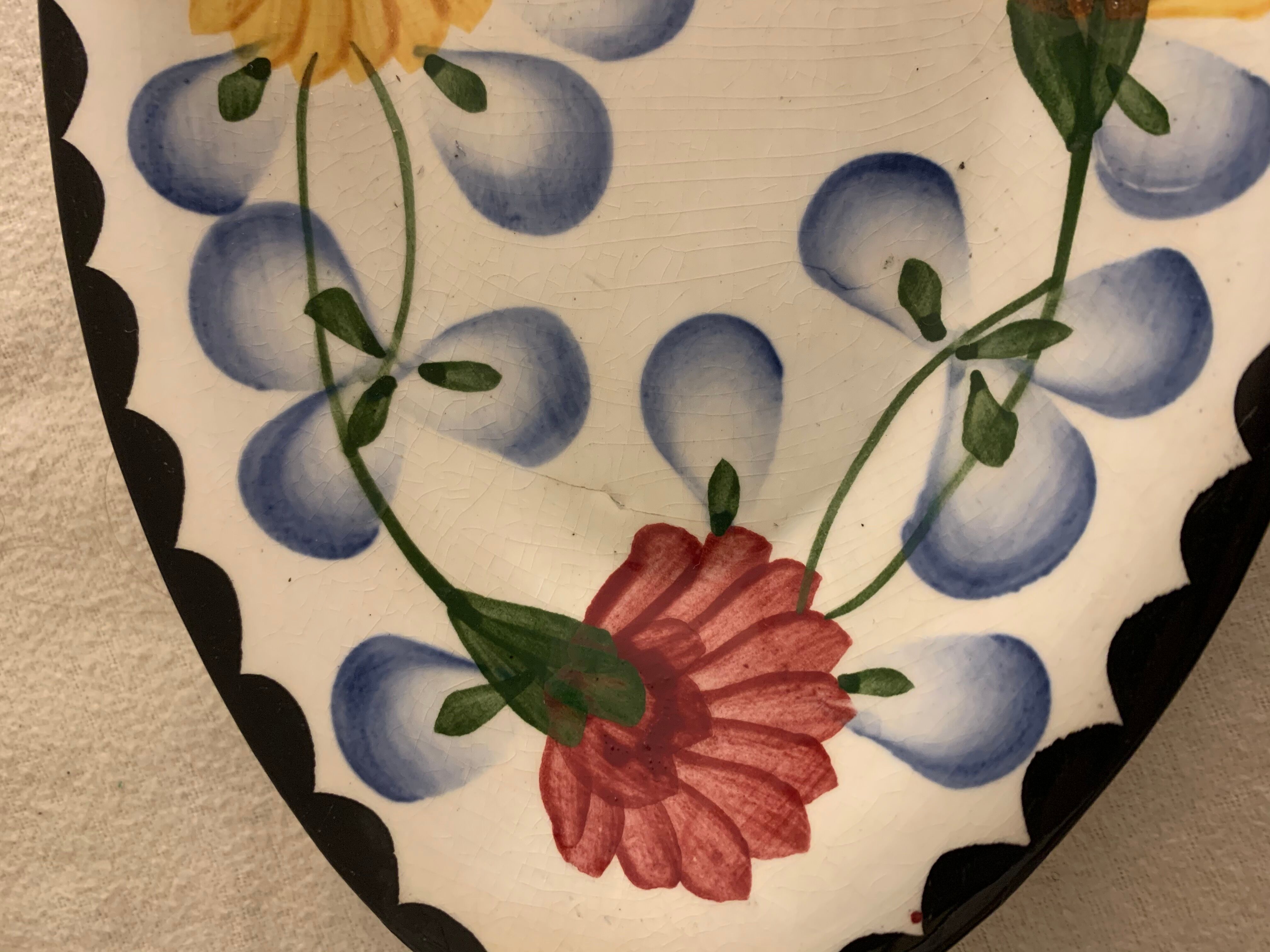 Pair of floral ravines in ancient earthenware Onnaing and CM Paris model Clovers