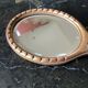 Hand-facing beveled mirror surrounded by wood dimension: height -38cm- width -15.5cm-