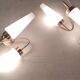 Asymmetrical brass wall lights with opaline shades, 1950s-60s.