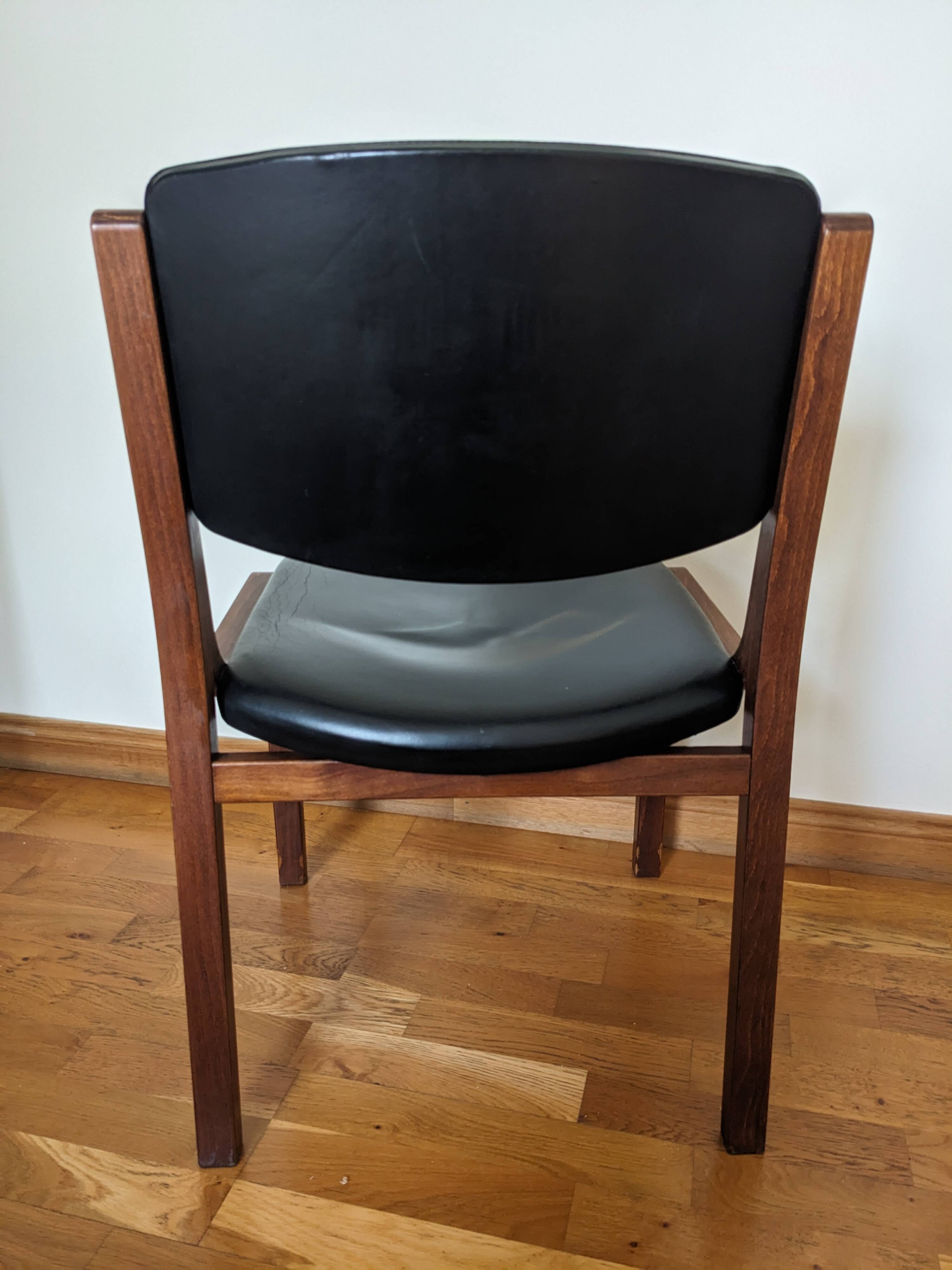 Vintage leather and wood chair pair