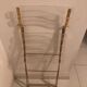 Folding chair in plexiglass and brass