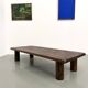 Modernist coffee table in solid elm, cylindrical pine base, 1970s.