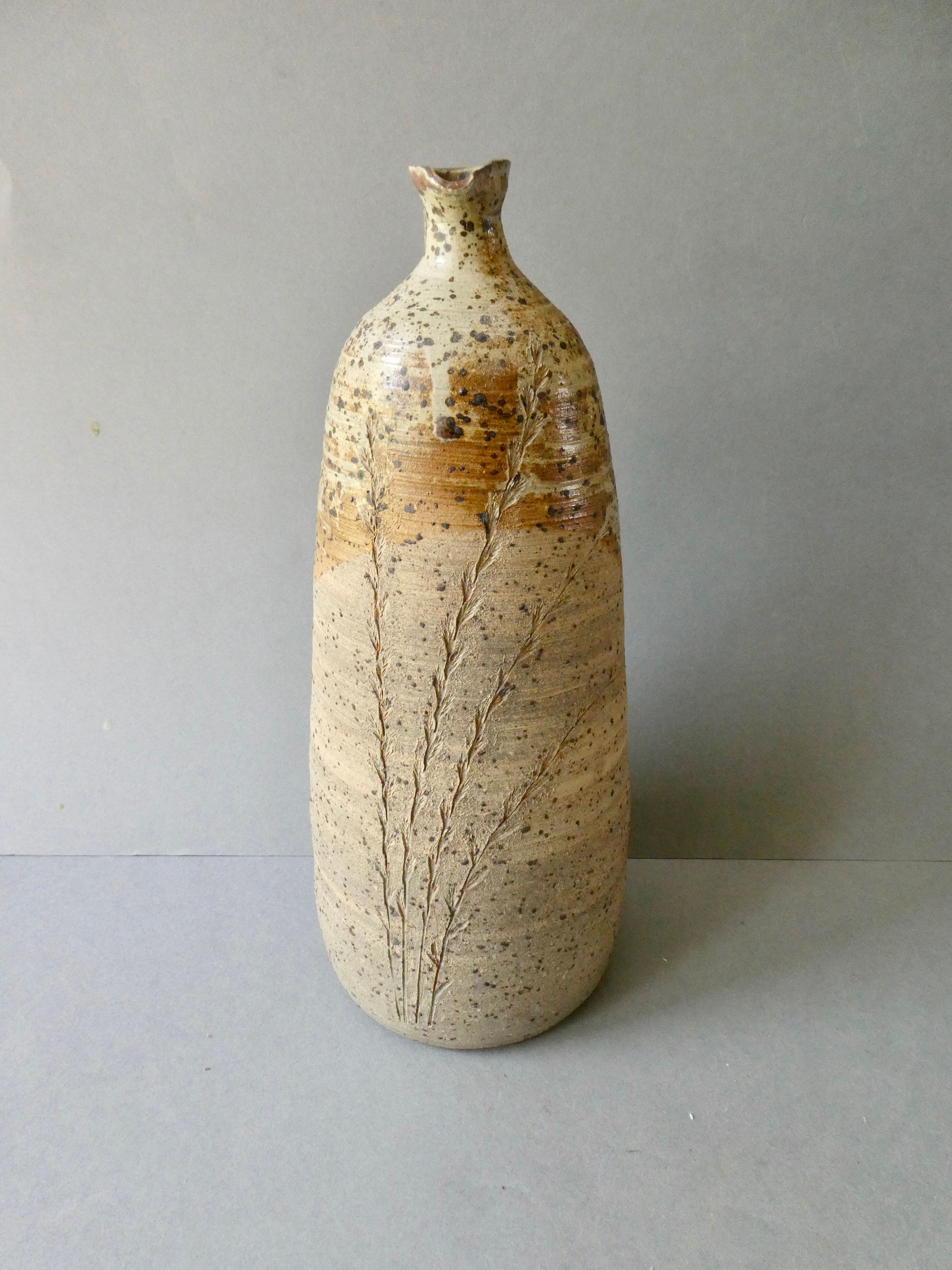 Stoneware bottle vase decorated with herbarium by Carole Boissière