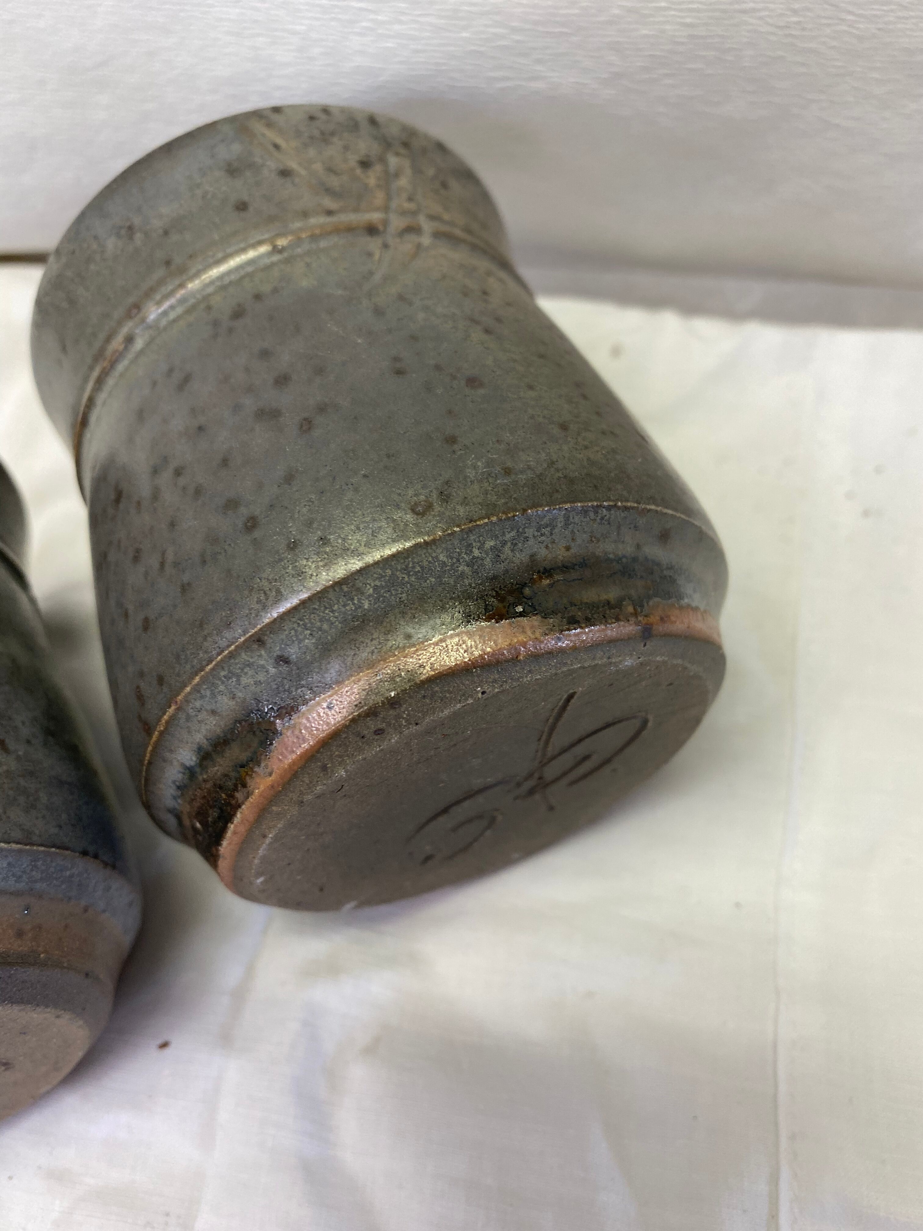 Set of 2 signed blue sandstone cups