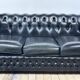 Vintage 1980 black leather Chesterfield sofa