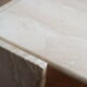 Table basse travertin Roche Bobois