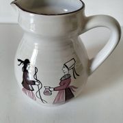 Ceramic pitcher from Quimper, created by Dominique Villard.