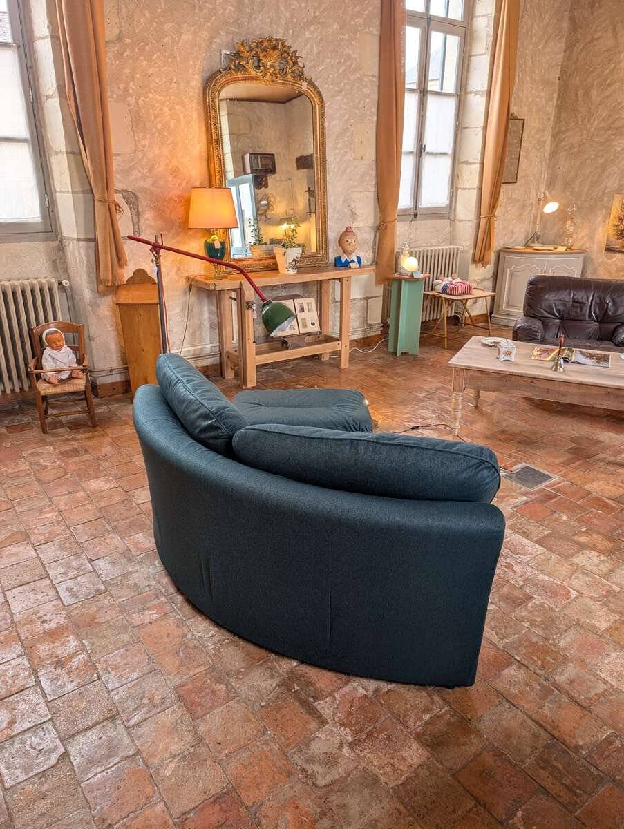 Chauffeuse angle vintage et son pouf