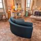 Chauffeuse angle vintage et son pouf