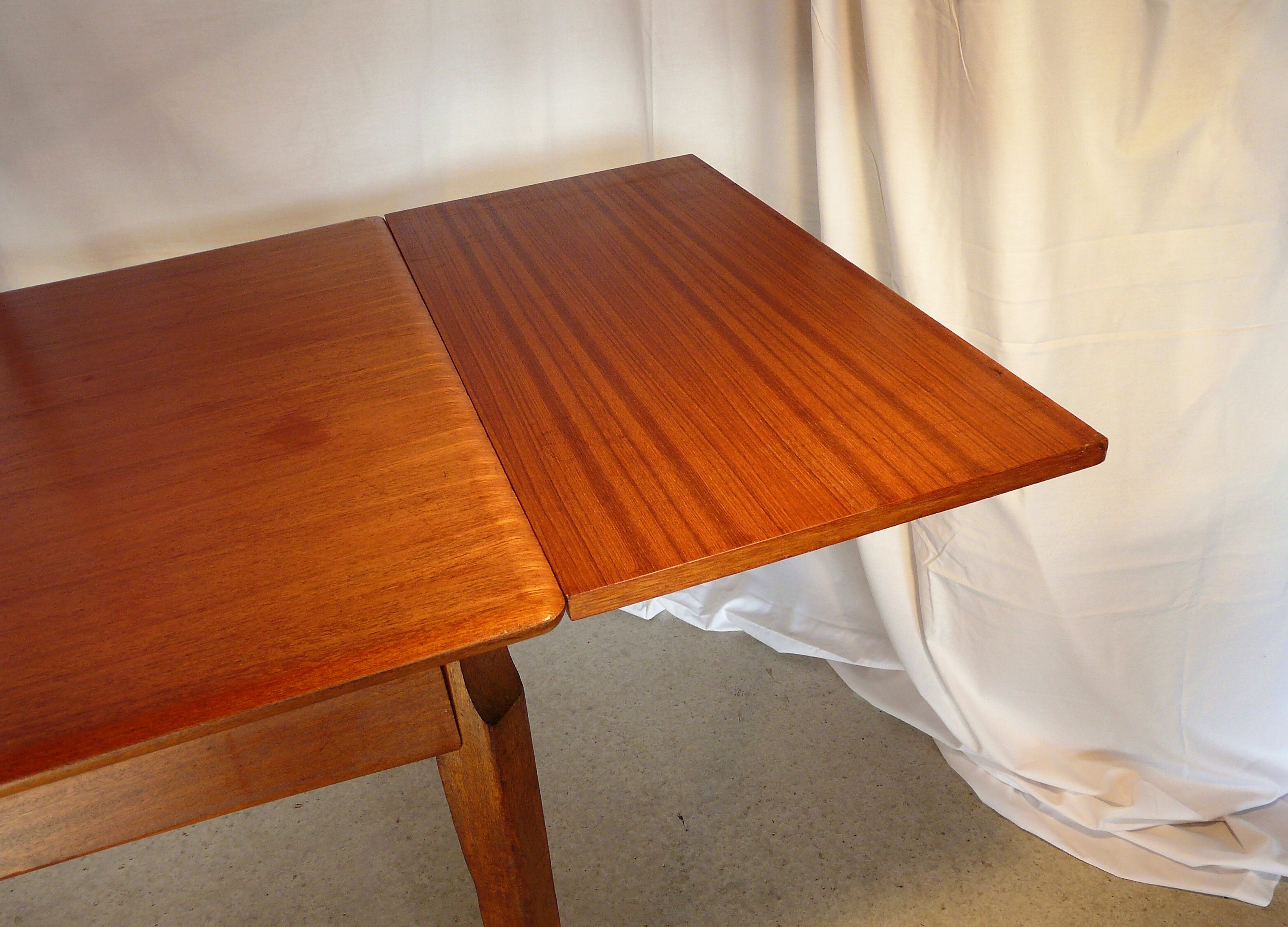 Scandinavian extendable rectangular teak table