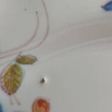 Decorative earthenware plate signed