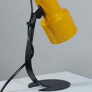 A pair of well-designed minimalist bedside lamps.