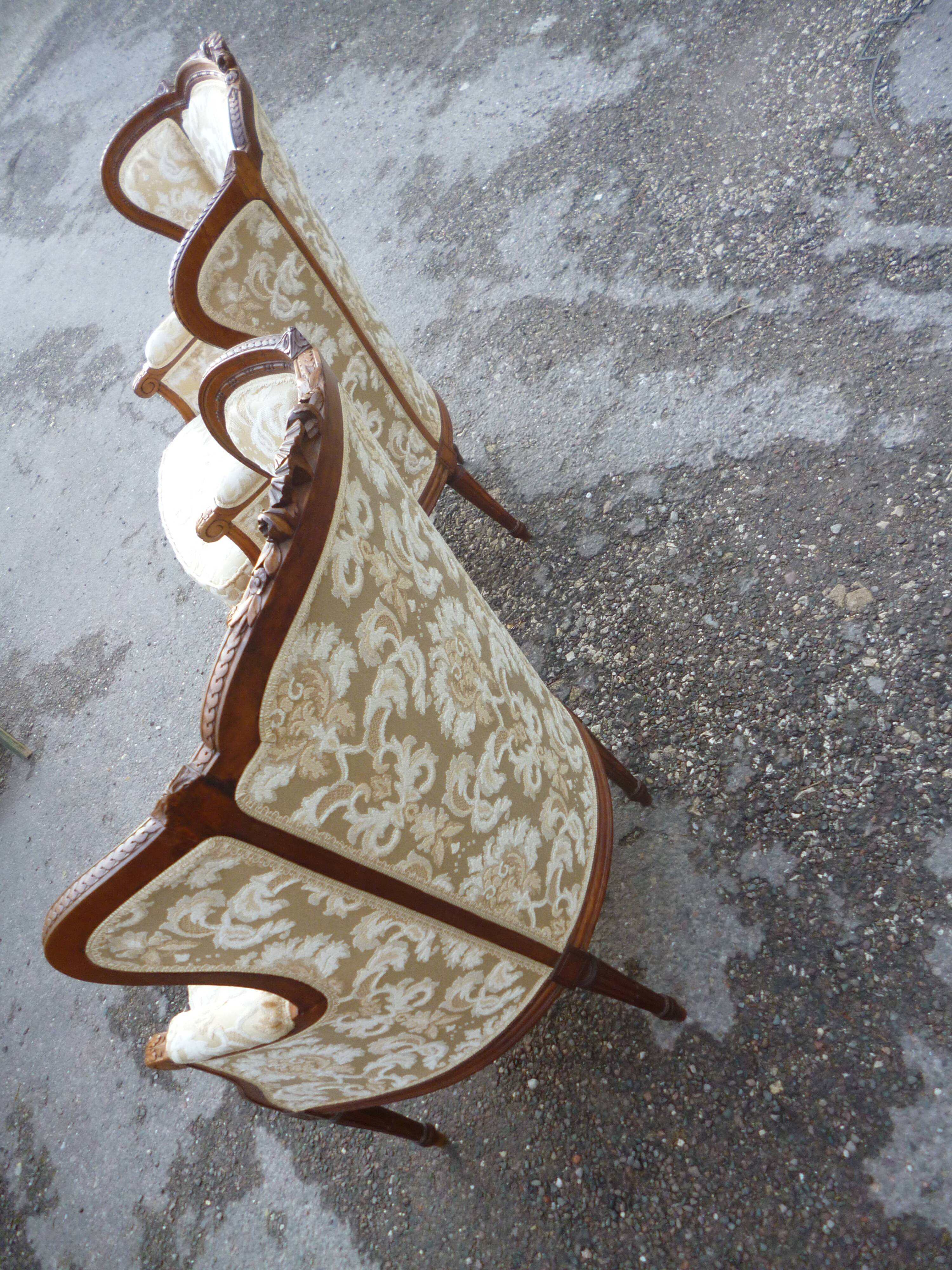 Pair of Louis XVI style armchairs with ears