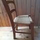 Wooden children's chair, rope seat, circa 1950