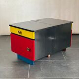 Pair of colorful massive teak night stands