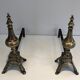 Paire de chenets en bronze ciselé et fer forgé de style Louis XVI