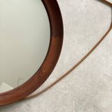 Mid Century solid teak wall mirror with a leather strap - Danish design
