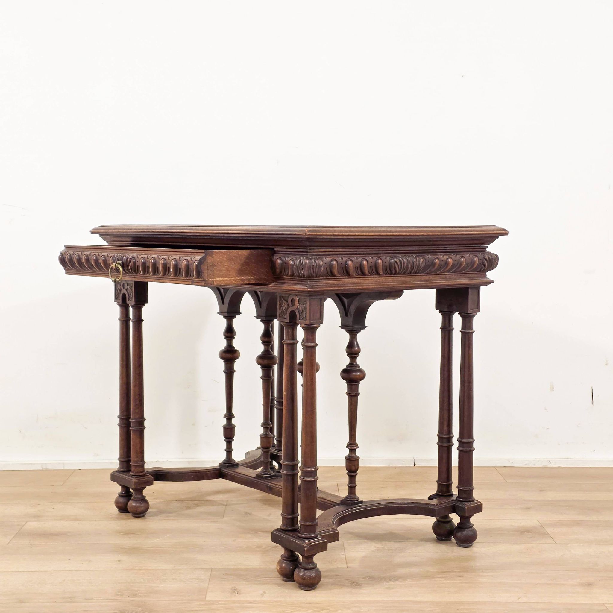 Carved walnut writer's desk in Renaissance style, late 19th century.