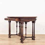 Carved walnut writer's desk in Renaissance style, late 19th century.