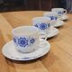 4 vintage coffee cups and their saucers