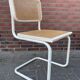 Cesca dining room chair designed by Marcel Breuer