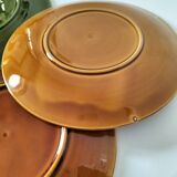 Set of green and amber enamelled plates