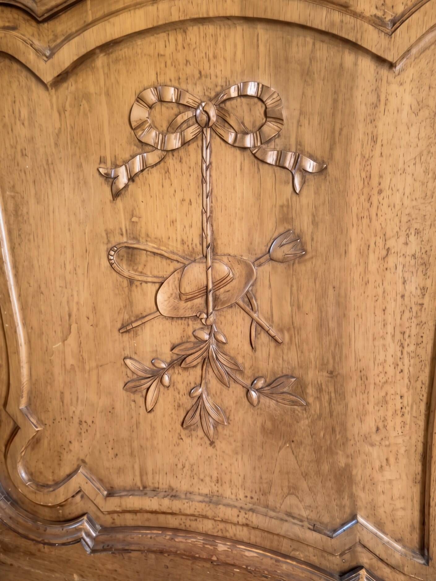 Antique wardrobe in classic style made of solid wood.